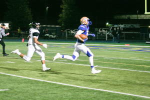 #2 Avery Verble caught a 58 yard pass and takes it to the goal line for a TD in first quarter. Sandburg defeats Joliet West 35-14 Friday Oct. 9, 2015. Copyright (C) Steve Neuhaus 2015. All Rights Reserved