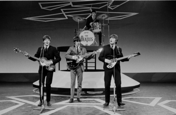 English: Paul McCartney, George Harrison, Jimm...