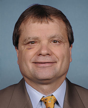English: Congressional portrait for Mike Quigley.