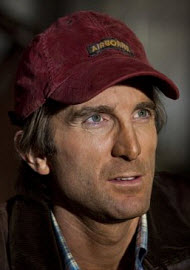 Sharlto Copley as H.M. "Howling Mad"...