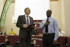 Morton West student, Niquan Dawson, joined the J. Sterling Morton High School District 201's Board of Education as the first official Student School Board Member after being sworn in by Superintendent Dr. Michael Kuzniewski 