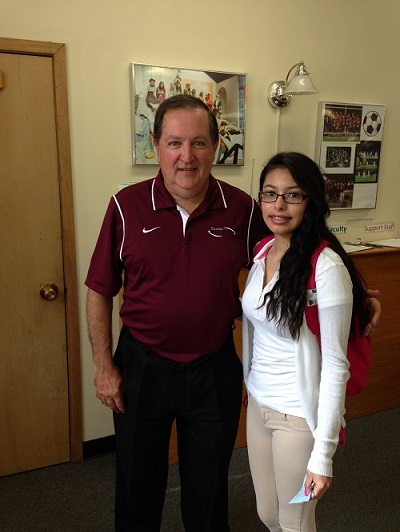 Morton West High School's Angela Juarez along with Mr. Joe Gunty, Principal of Morton West.