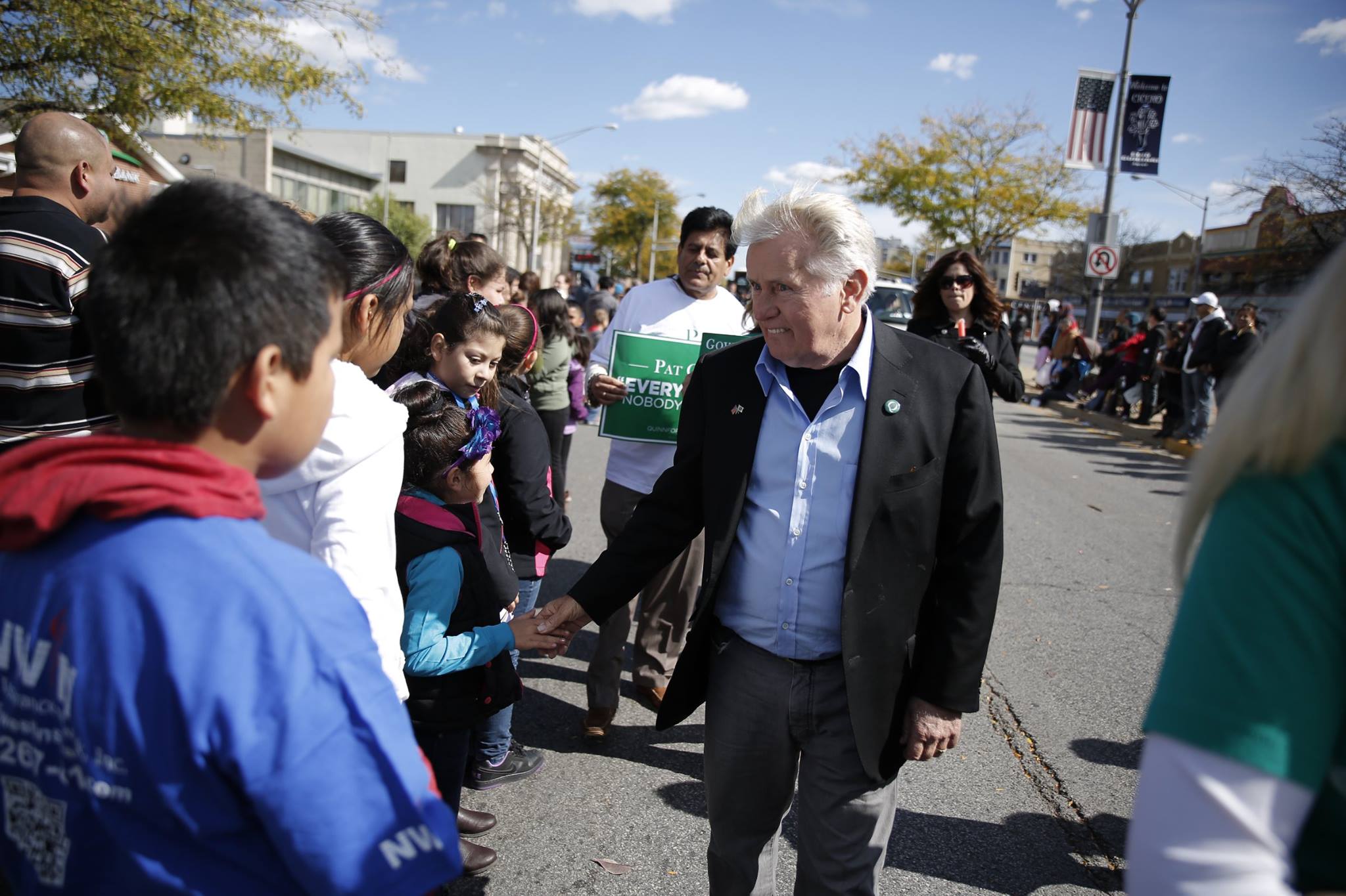 Actor Martin Sheen greets attendees at the 46th Annual Houby Day Parade in Cicero along Cermak Road Sunday Oct. 5, 2015