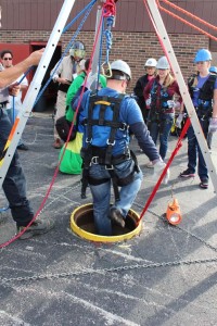 Photo shows OFPD firefighters training for pipe/sewer rescue situation during training sessions held at the Fire District this past summer (2014).
