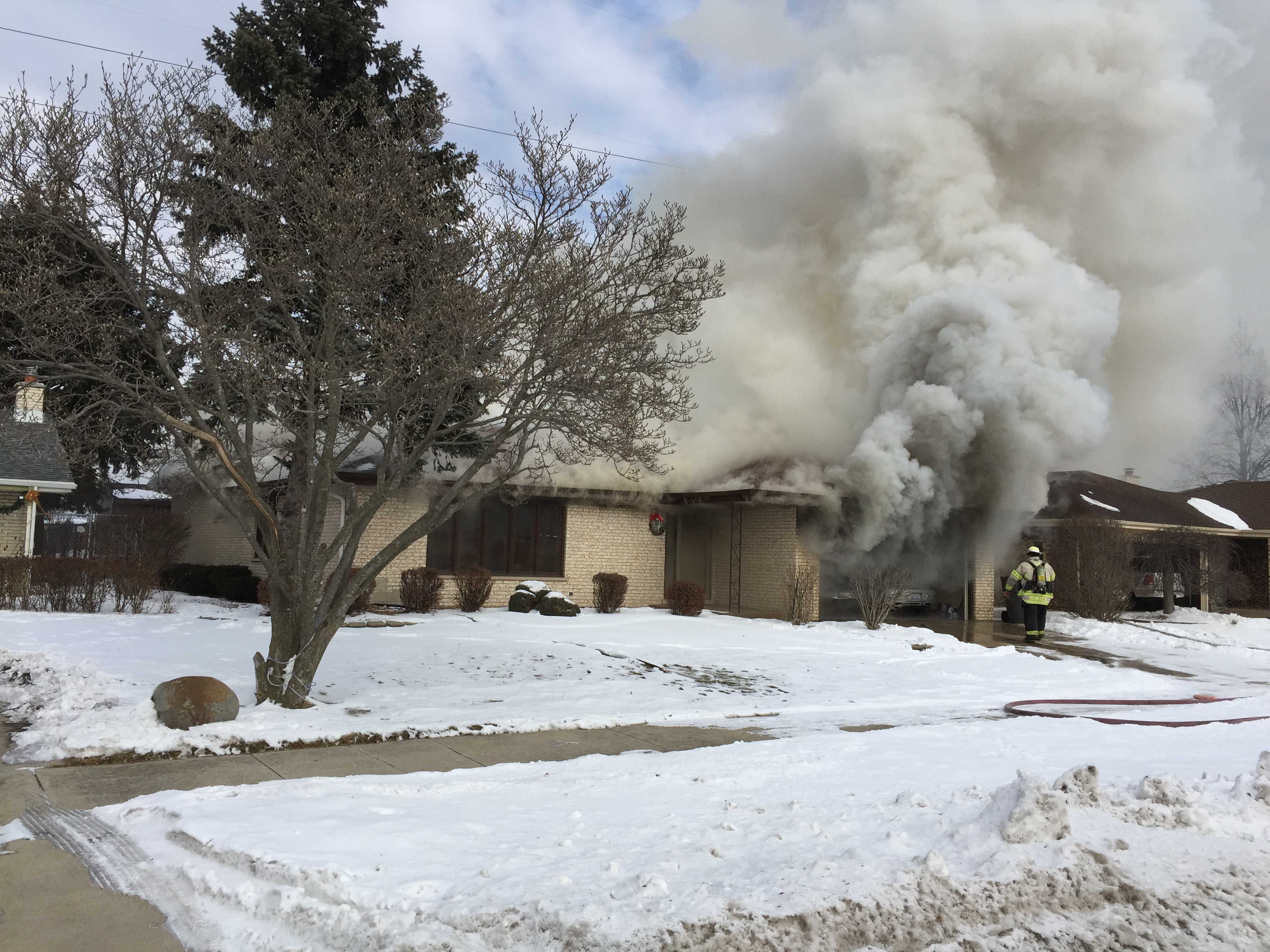 Orland Fire Protection District firefighters battle a home fire in Orland Park on Wednesday Jan. 14, 2015. Photo courtesy of the Orland Fire Protection District