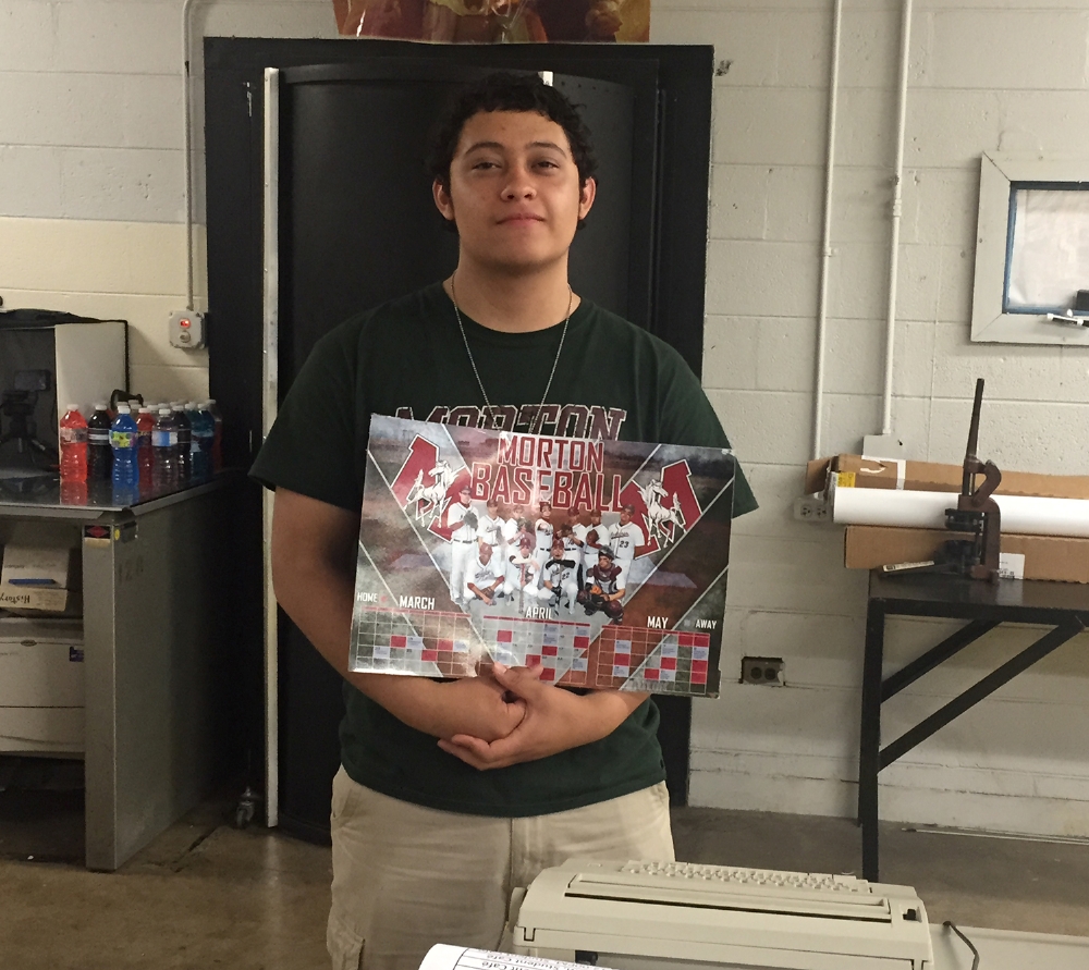 Anythony Valdovinios, Morton West Class of 2016, with his design of the 2015 Morton Varsity Baseball Poster