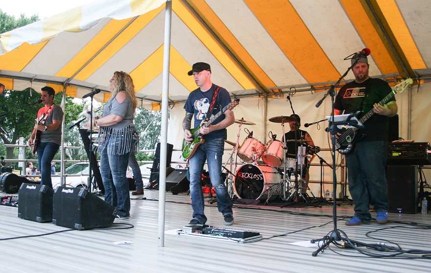 Rockin The Fest: The crowd was entertained Saturday evening by Southside favorite Reckless who played an assortment of favorites. Photos Copyright (C) Steve Neuhaus 2015. All Rights Reserved. Permission to reprint with full attribution to Steve Neuhaus and the Illinois News Network..