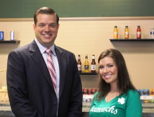 Lyons Mayor Getty poses with an employee at a new business, the Shamrock Cafe, in Lyons