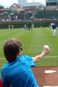 Aaron Hanania at Wrigley Field early at the dugout