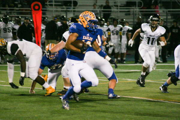 A Sandburg player carries the ball in the 1st half. Sandburg defeats Joliet West 35-14 Friday Oct. 9, 2015. Copyright (C) Steve Neuhaus 2015. All Rights Reserved
