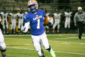 andburgs Ayo Ablona gains some yardage during the 1st half. Sandburg defeats Joliet West 35-14 Friday Oct. 9, 2015. Copyright (C) Steve Neuhaus 2015. All Rights Reserved