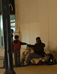 Gerardo Gomez handing out food to the needy