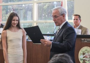 Rhythmic Gymnast and Olympic hopeful Evita Griskenas receives recognition for her achievements from Village of Orland Park Mayor Dan McLaughlin Monday June 20, 2016