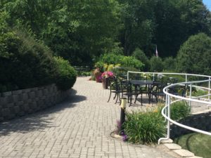 The outdoor patio which offers a breathtaking view of the beautiful Lake Geneva lake from the Geneva Inn