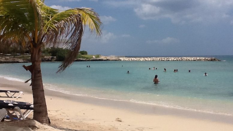This beach at the Grand Palladium/Lady Hamilton resort in Jamiaca looks great in the photo. But in reality, the beach is small and is strewn with coral and rock. The beach area in front of the Lady Hamilton (on the right) is covered in coral reef and not a great place to swim.