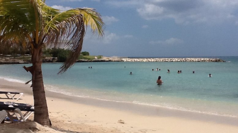 This beach at the Grand Palladium/Lady Hamilton resort in Jamiaca looks great in the photo. But in reality, the beach is small and is strewn with coral and rock. The beach area in front of the Lady Hamilton (on the right) is covered in coral reef and not a great place to swim.